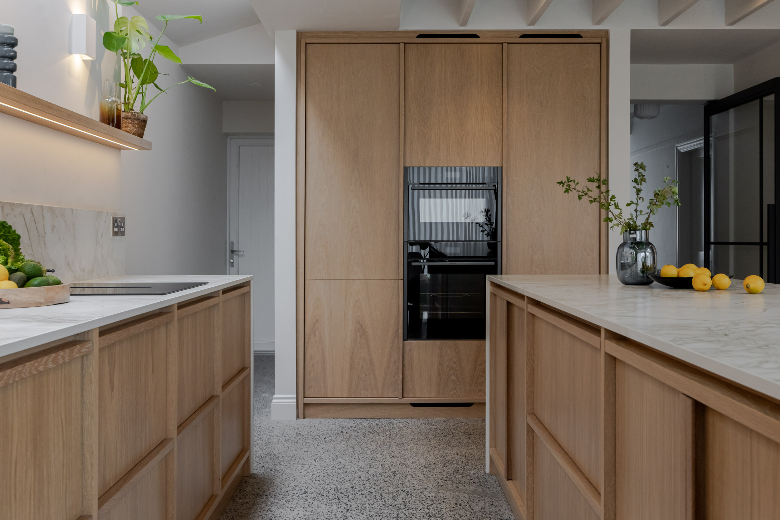AOS bespoke kitchen soft textures natural light warm timber tones bespoke joinery